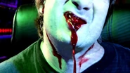 ...and having him to vomit blood after the devastating sound effects damage his internal organs, killing him.