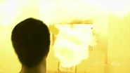 ...it suddenly explodes, causing the chamber's door to be blasted off its hinges and sent flying into Chung, subsequently decapitating and therefore killing him.