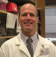 Tom-Carmichael-People-Behind-the-Science