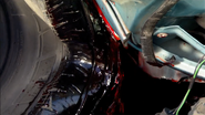 Toby's blood on the popped tire.