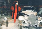 Cruella and Horace costume with Cruella's car at the "101 Dalmatians" exhibit at Disney Hollywood Studio.