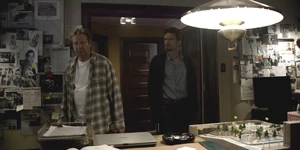 Al shows Jake his extensive research on the Kennedy assassination.