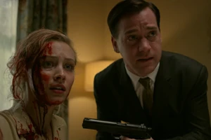 Sadie's ex-husband, Johnny, holds her hostage.