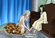 Sanshi washing Taiki's feet.