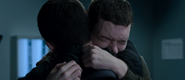 Tyler crying in Clay's arms