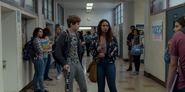 Alex and Jessica in the school hallway