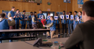 Jock asking a girl to Homecoming