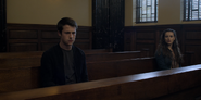 Clay sits upset in the courtroom