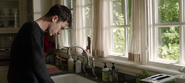 Clay standing at the kitchen counter