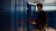 Charlie putting Bryce's tape in Monty's locker