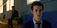 Clay Jensen looking at Jeff's memorial getting put up