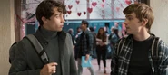 Winston and Alex walking the hallways