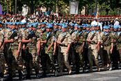A multinational UN battalion at the 2008 Bastille Day military parade. Date: 2008. Attribution: © Marie-Lan Nguyen / Wikimedia Commons / CC-BY 2.5.