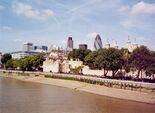 The London Tower and The Gherkin office building in front of office buildings. Author:Crux.