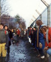 Embracing the base, Greenham Common December 1982 - geograph.org