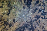 "Warsaw, capital of Poland, split by the Vistula River as it flows to the Baltic." Caption by astronaut Chris Hadfield on board the International Space Station in 2013.