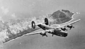 392d Bombardment Squadron - B-24 Liberator.jpg (85 KB) A B-24 Liberator flies over Iwo Jima in March 1945. America helping to save Asia from genocidal Axis forces?