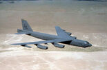 A B-52H from Barksdale AFB flying over the desert.