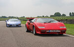 The Lamborguni Diablo (background) was named for a legendary bull, while the Lamborgini Countach (foreground) broke from the bullfighting. Date: 1 June 2008, authors- Brian Snelsonand AniRaptor2001.