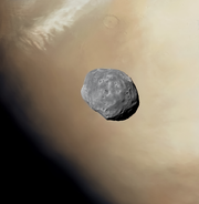 Phobos over Mars - Peridier Crater, Syrtis Major quadrangle - ESA Mars Express (52568167027)