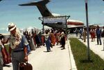 Arrival of UN Visiting Mission in Majuro, Trust Territory of the Pacific Islands (1978). The sign reads "Please release us from the bondage of your trusteeship agreement."