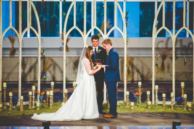 Austin and Joy exchanging vows.