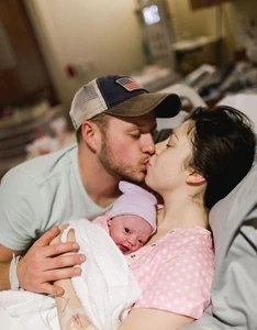 Josiah, Lauren, and baby Bella.
