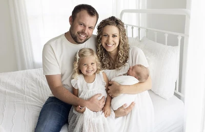 John, Abbie, Grace, and baby Charlie.