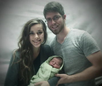 Ben, Jessa, and baby Spurgeon.