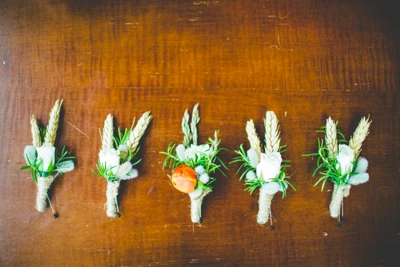 The men's boutonnieres.