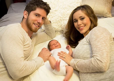 Ben, Jessa, and baby Spurgeon.