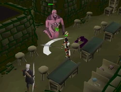 The player and Vertida fight the weakened abomination.