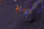 A safespot in the Catacombs of Kourend, whilst giants are aggressive.