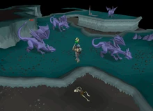 A player fighting mithril dragons on the upper level.