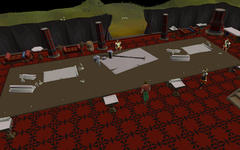 The three captains strategising on a large table.