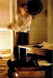 Jack handcuffed to a pole on the E deck.