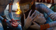 Neytiri embracing Neteyam's dead body.
