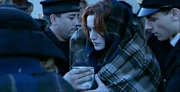 Fifth Officer  gives Rose a cup of coffee.
