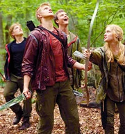 Cato and Glimmer attempt to attack Katniss while she's in a tree hiding.