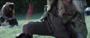 Glimmer ejects her knife out of the District 6 female after stabbing her to death.