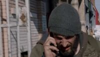 10x01 Grimes on phone