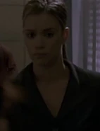 1x12 CTU staffer black suit ponytail.jpg (15 KB) As CTU staffer (Season 1)