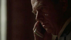 President Logan talking to 