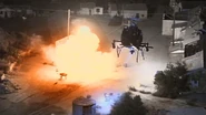 An AH-6 Little Bird from Delta Force's aviation squadron destroys an abandoned car in Posta Mita.