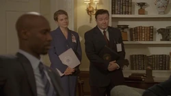 Ricky Gervais observes the meeting with the Ambassador