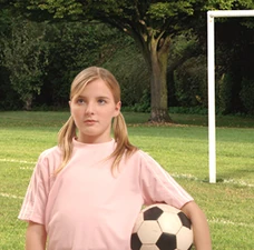 Madison Holt playing soccer