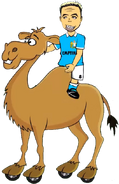 Samir Nasty riding a camel.