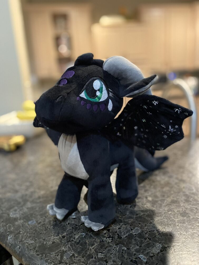 Shots of my Qibli and Moon plushies :) the wings of fire plushie