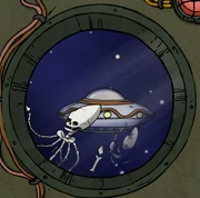 The alien skeleton outside the spaceship's window