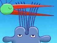 The Snip Snip Bird cutting Henrietta's hair.